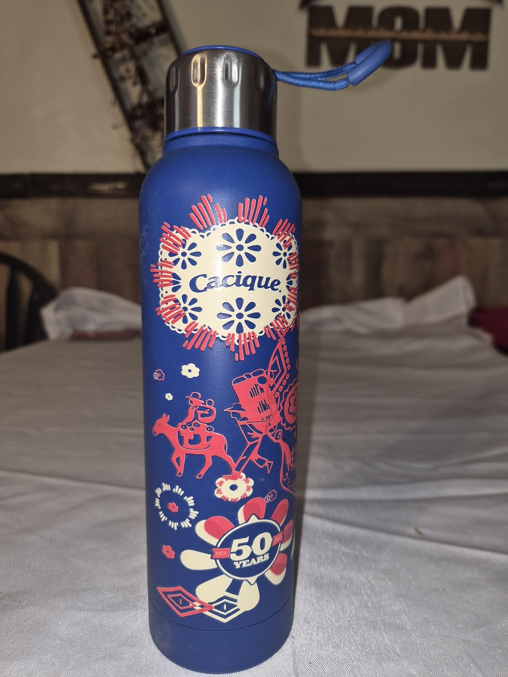 Cacique Blue Water Bottle with Pink and Cream Floral Accents
